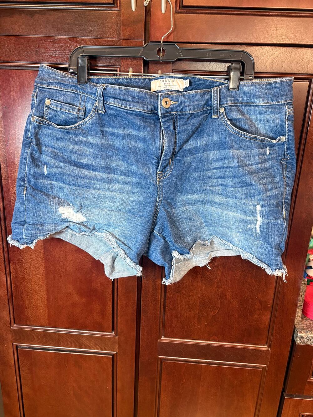Torrid Women's Distressed Denim Shorts Medium Wash Raw Hem  Size 20